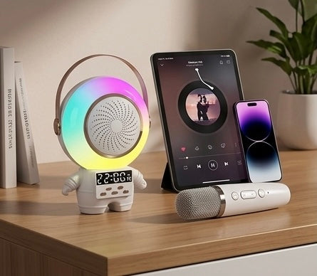 Parlante Bluetooth Astronauta Lunar XM-X66 – Kit Karaoke con 2 Micrófonos Inalámbricos, Luces RGB y Reloj Alarma